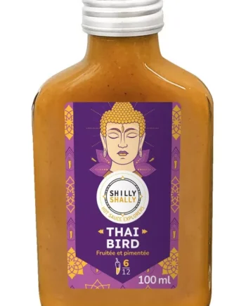 Bouteille de sauce piquante Shilly Shally Thai Bird, 100ml, au goût fruité et pimenté, étiquette violette avec motif exotique.
